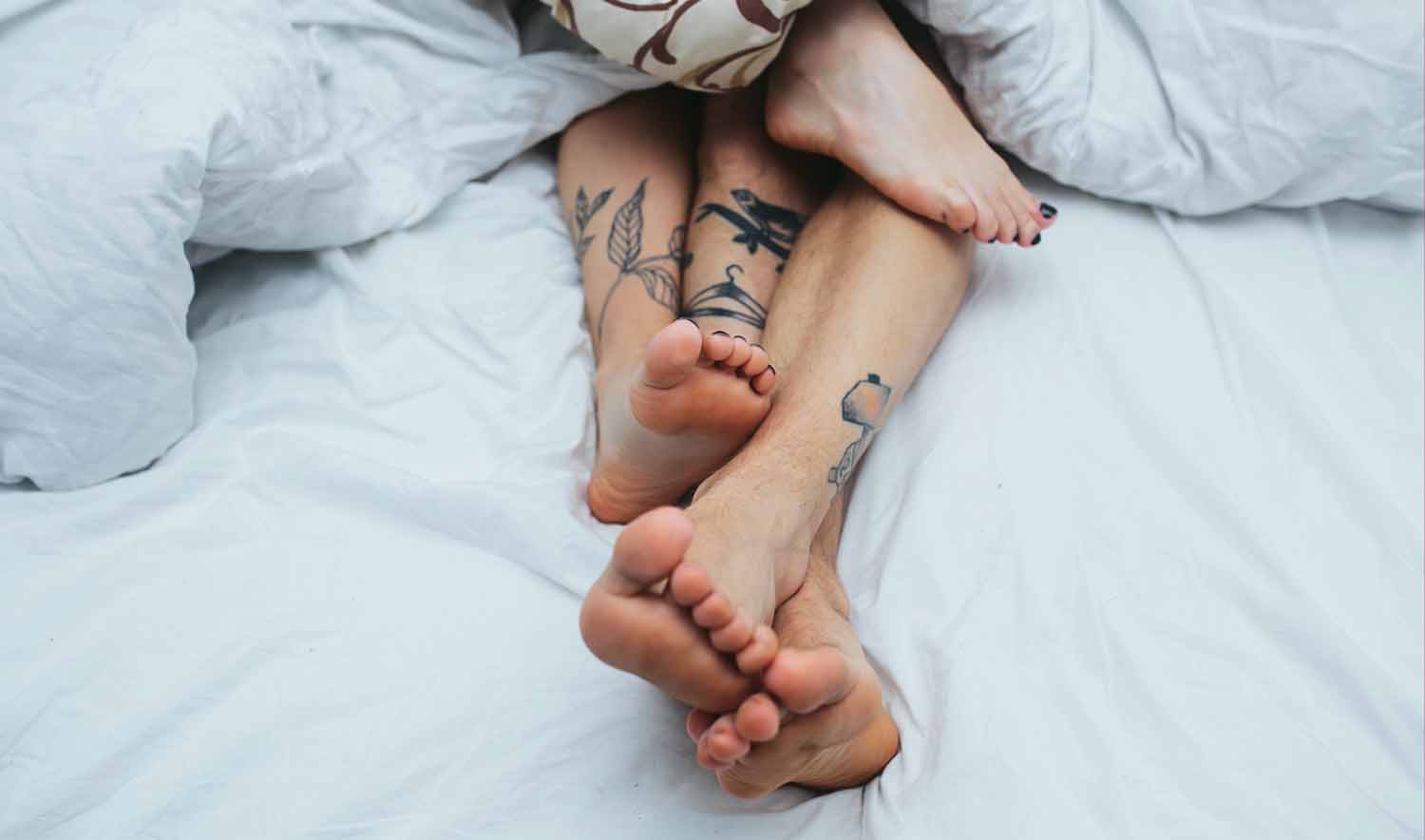 feet-couple-bedB